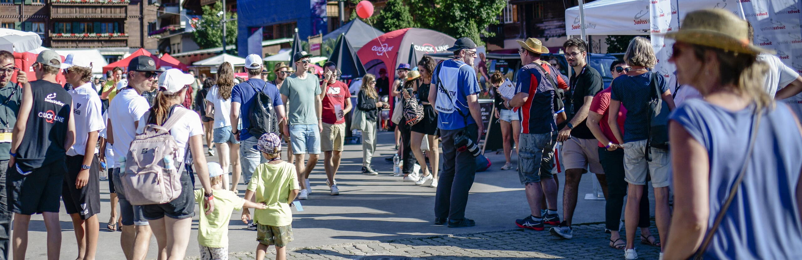 beach village, booths, fans, fan zone